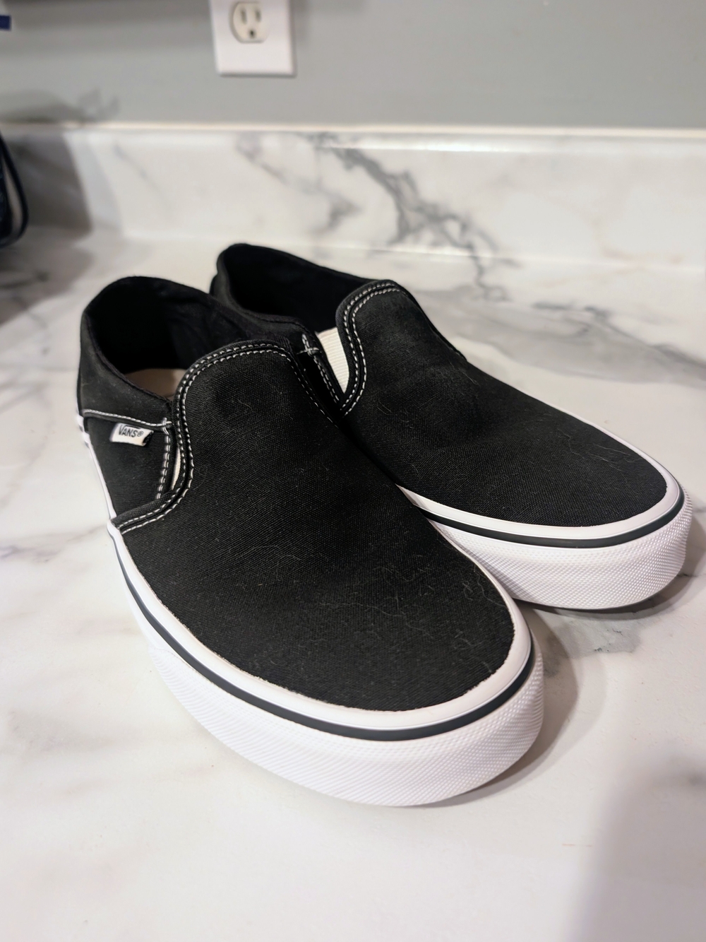 Vans Black & White Slip-On Canvas Sneakers - Women's 9.5